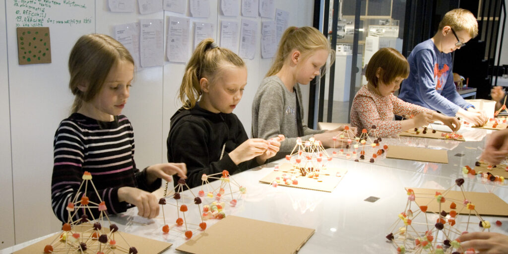 Kids constructing small models