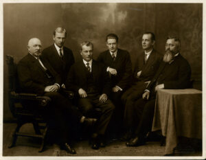 Nikolai Kusmin's thesis defence at Tallinn Technical University, 1930. On the right is lecturer Artur Perna, known to his students as Habe.